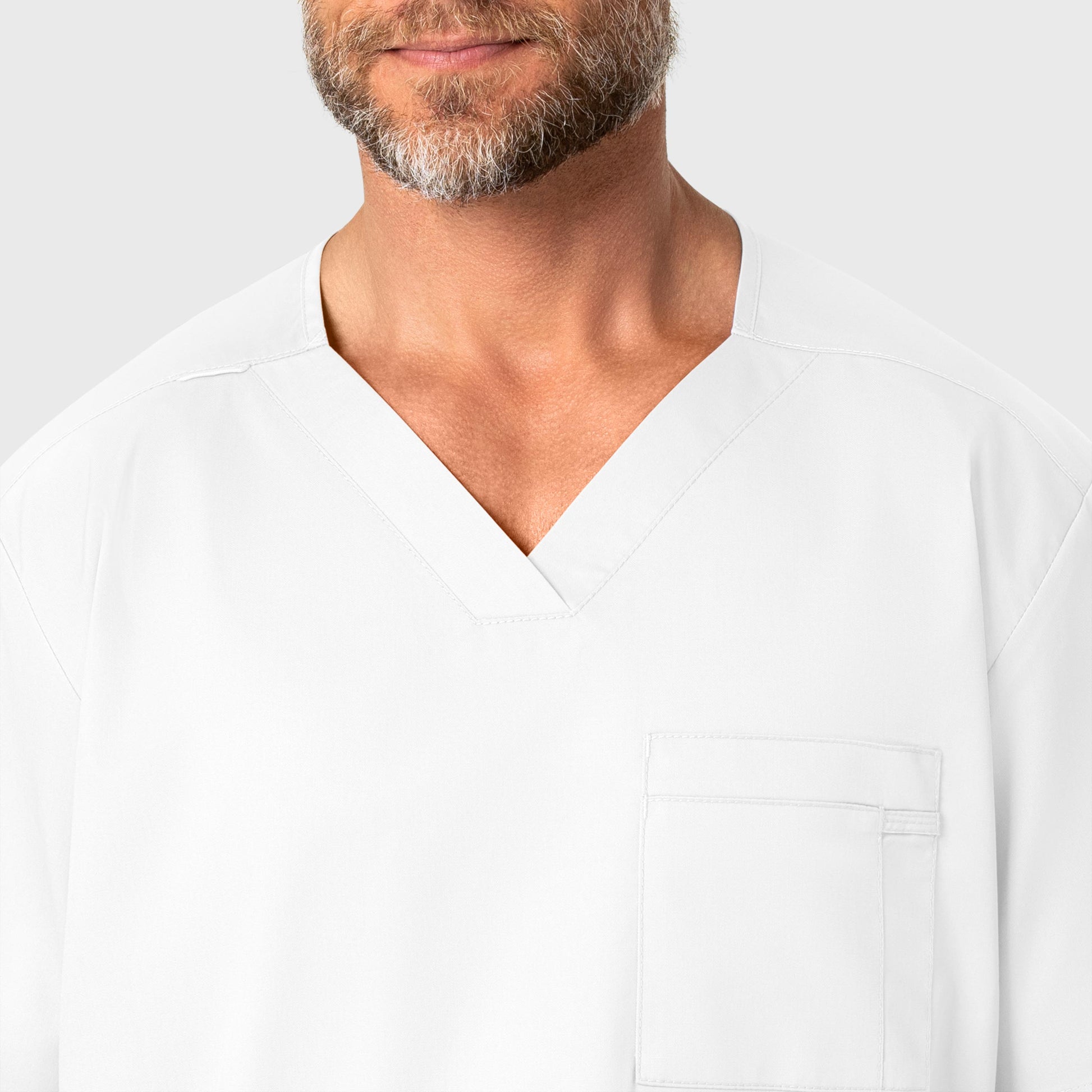 WonderWORK 103 Men's V-Neck Scrub Top White Model Image Left Side | Wink