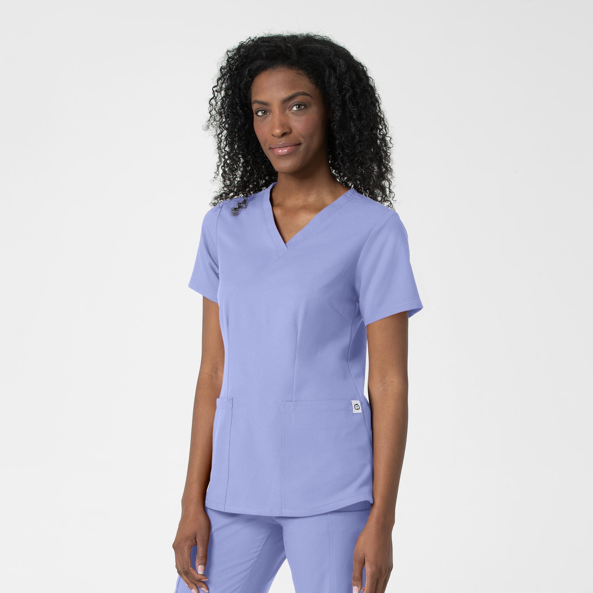 Thrive 6122 Fitted 3-Pocket V-Neck Scrub Top Ceil Blue Model Image Right Side | Wink