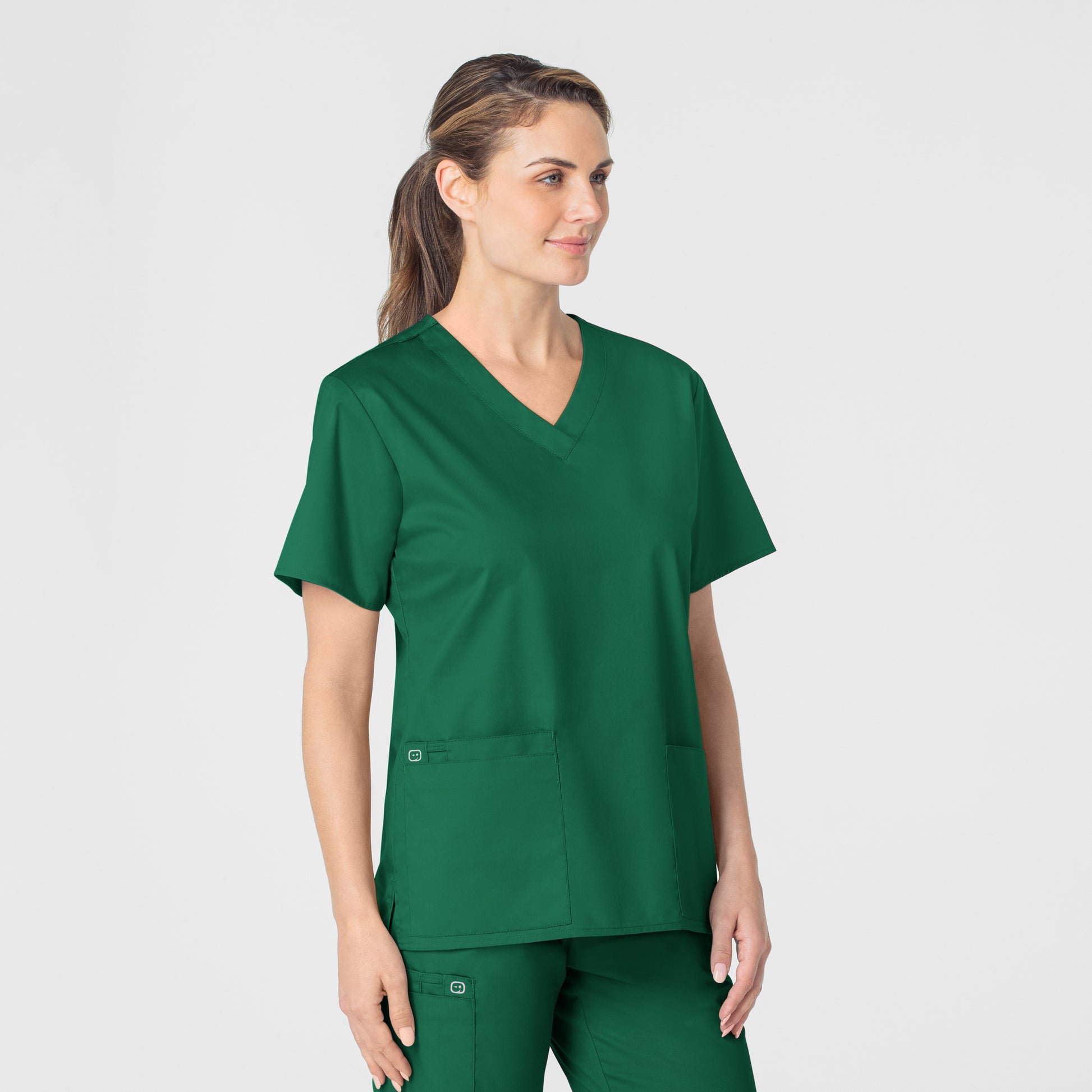 WonderWORK 101 V-Neck Scrub Top Hunter Model Image Right Side | Wink