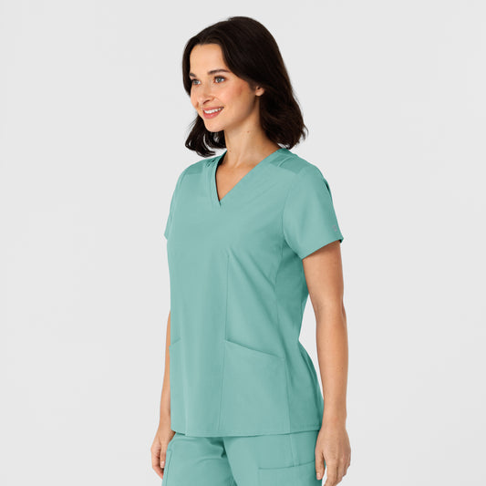 W123 6145 Flex-n-Reach Side Panel V-Neck Scrub Top Turquoise Model Image Right Side | Wink