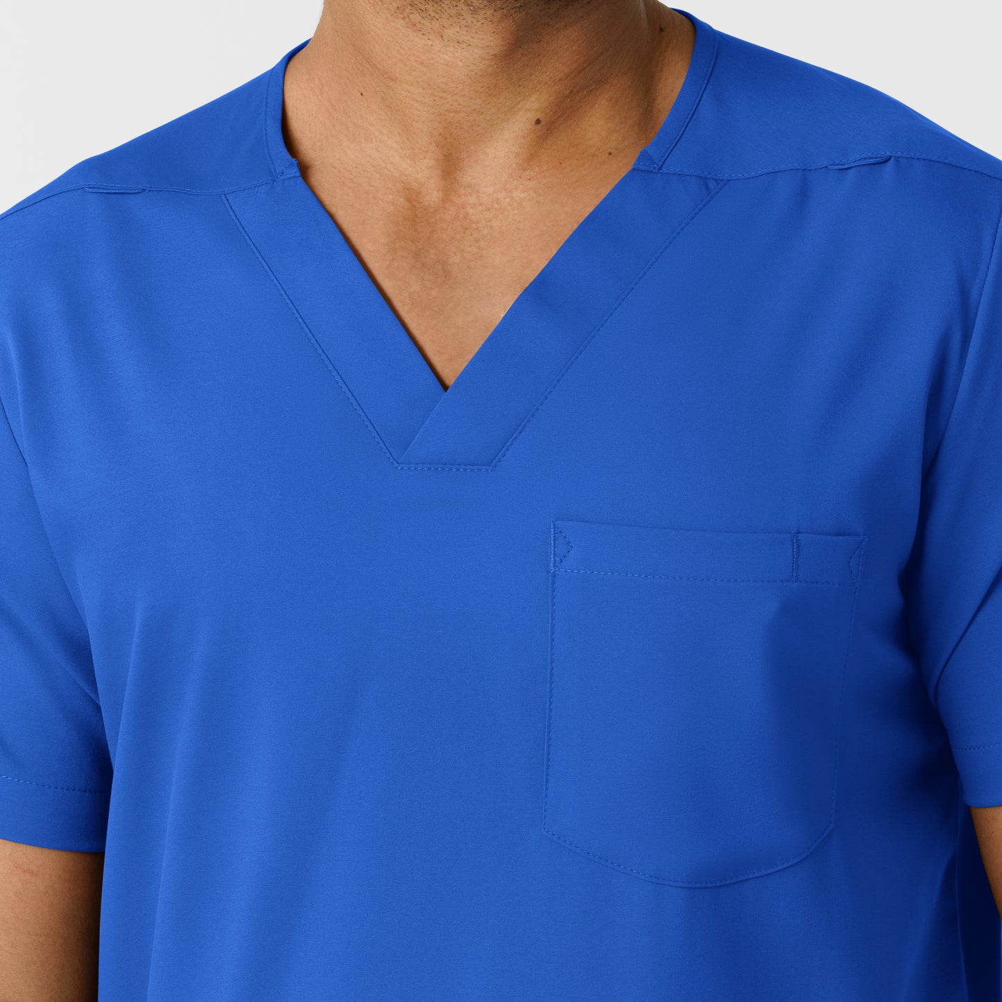 Boundless 6351 Men's Multi Pocket V-Neck Scrub Top Royal Model Image Left Side | Wink