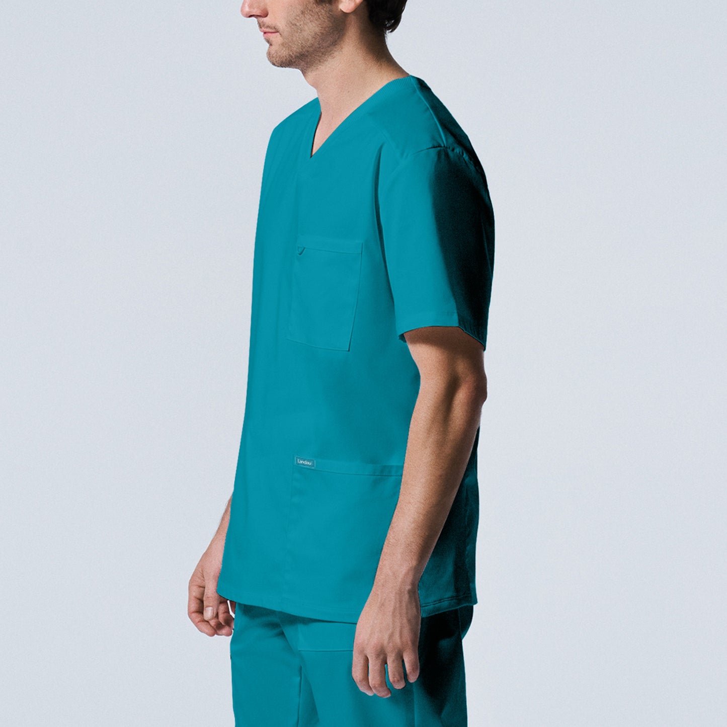 ProFlex LT109 Men's 4 Pocket V Neck Scrub Top Teal Image