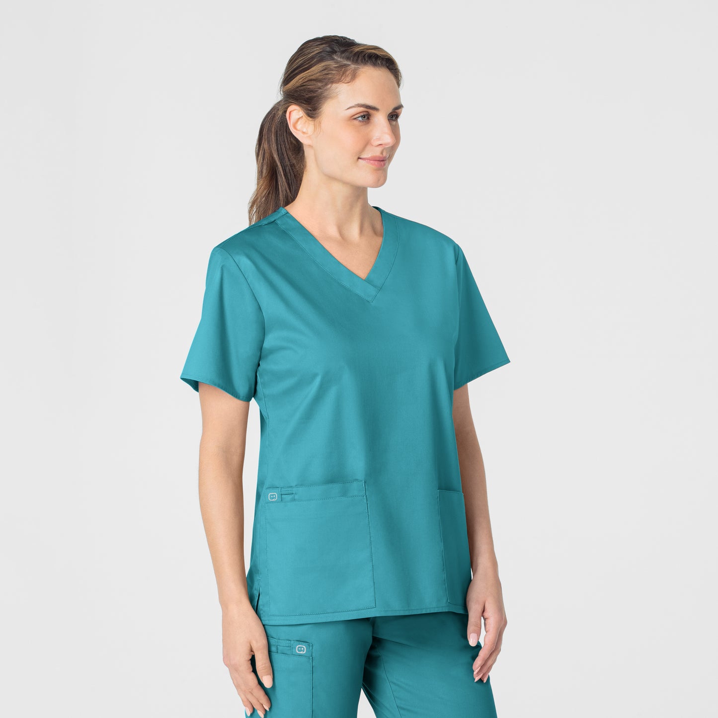 WonderWORK 101 V-Neck Scrub Top Teal Blue Model Image Right Side | Wink