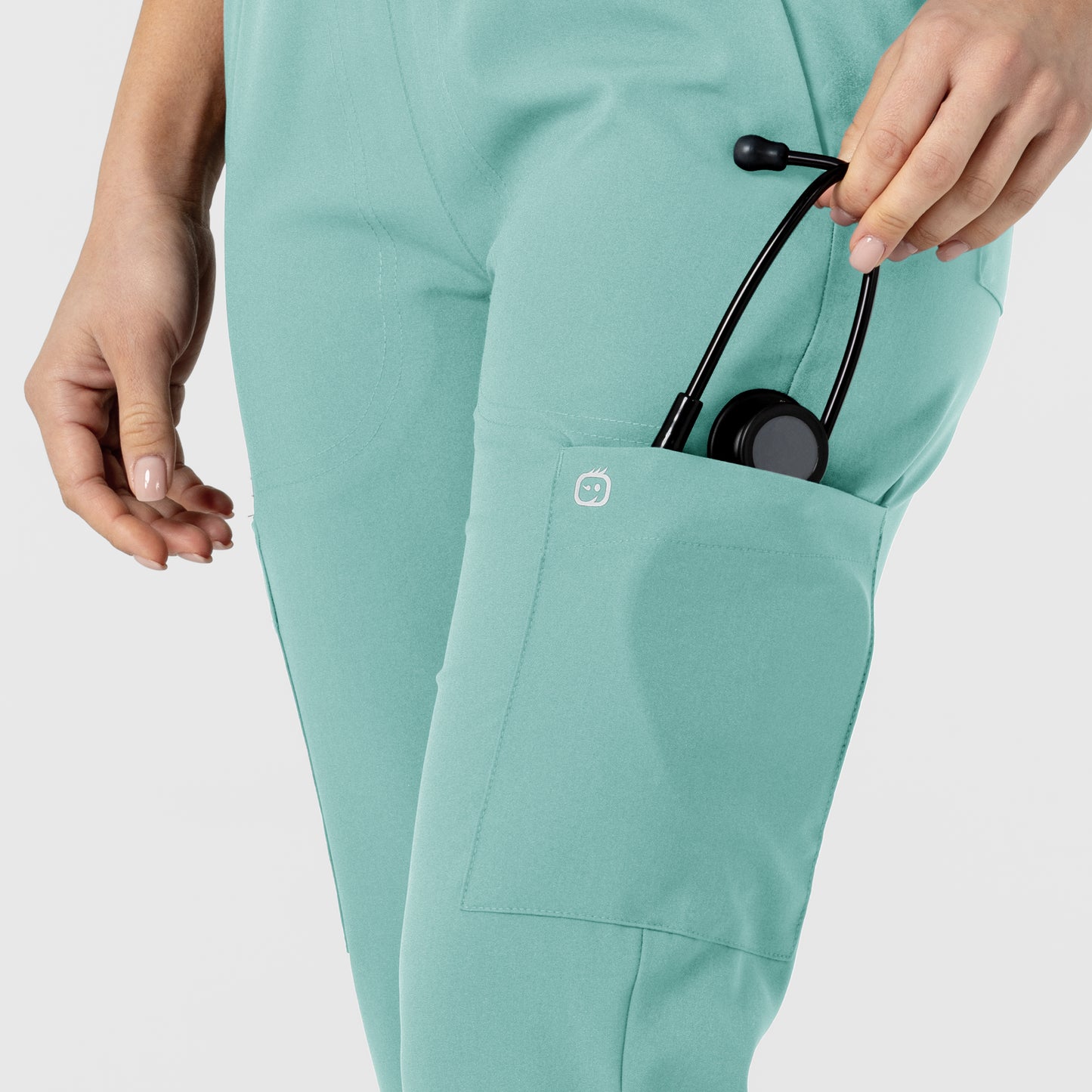 W123 5045 Flex-n-Reach Track Scrub Pants Turquoise Model Image Alternate | Wink