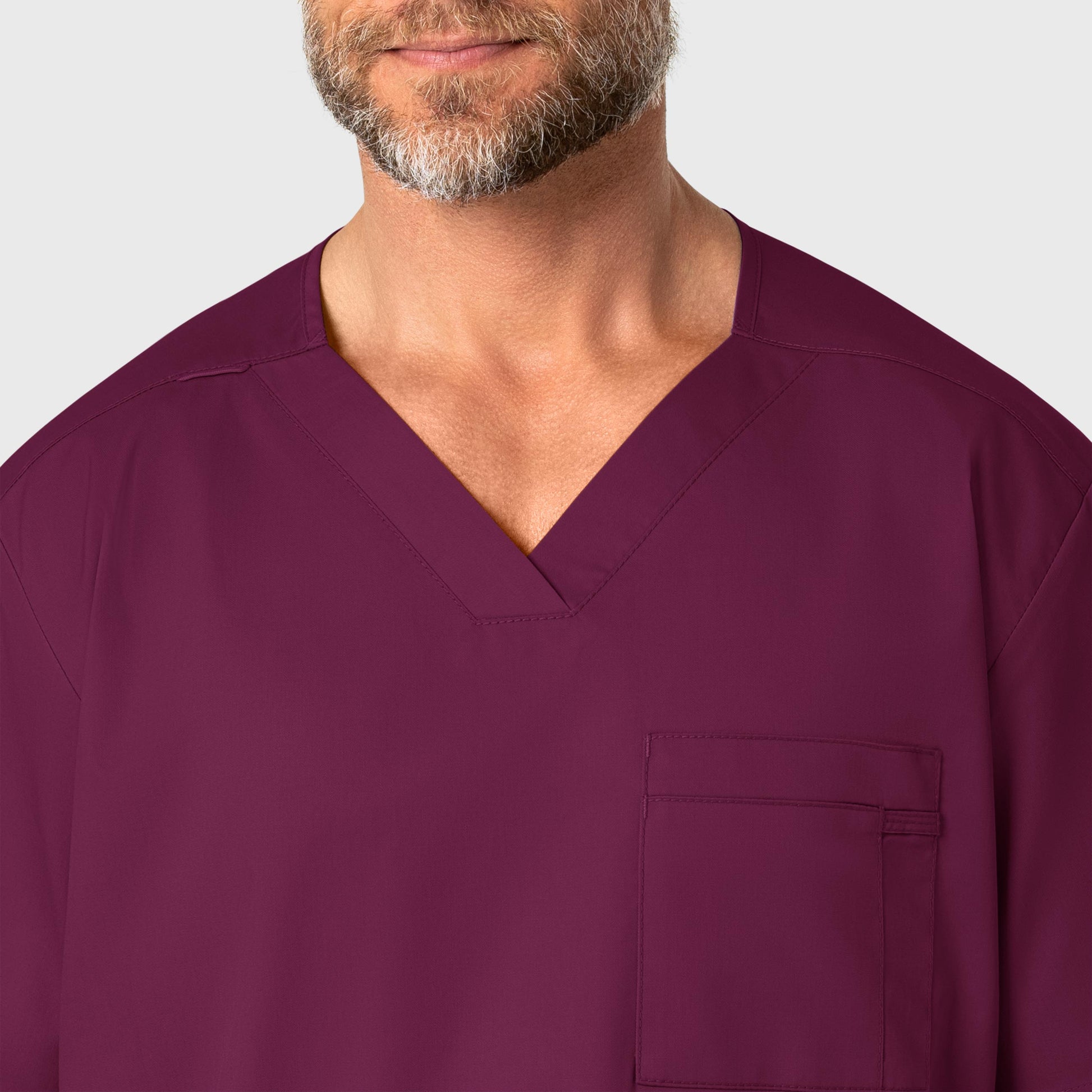 WonderWORK 103 Men's V-Neck Scrub Top Wine Model Image Left Side | Wink