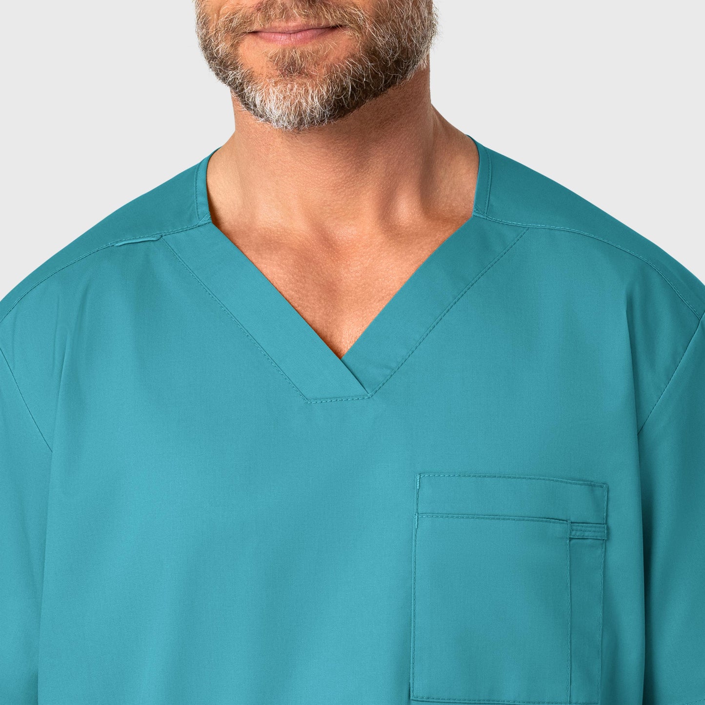 WonderWORK 103 Men's V-Neck Scrub Top Teal Blue Model Image Left Side | Wink