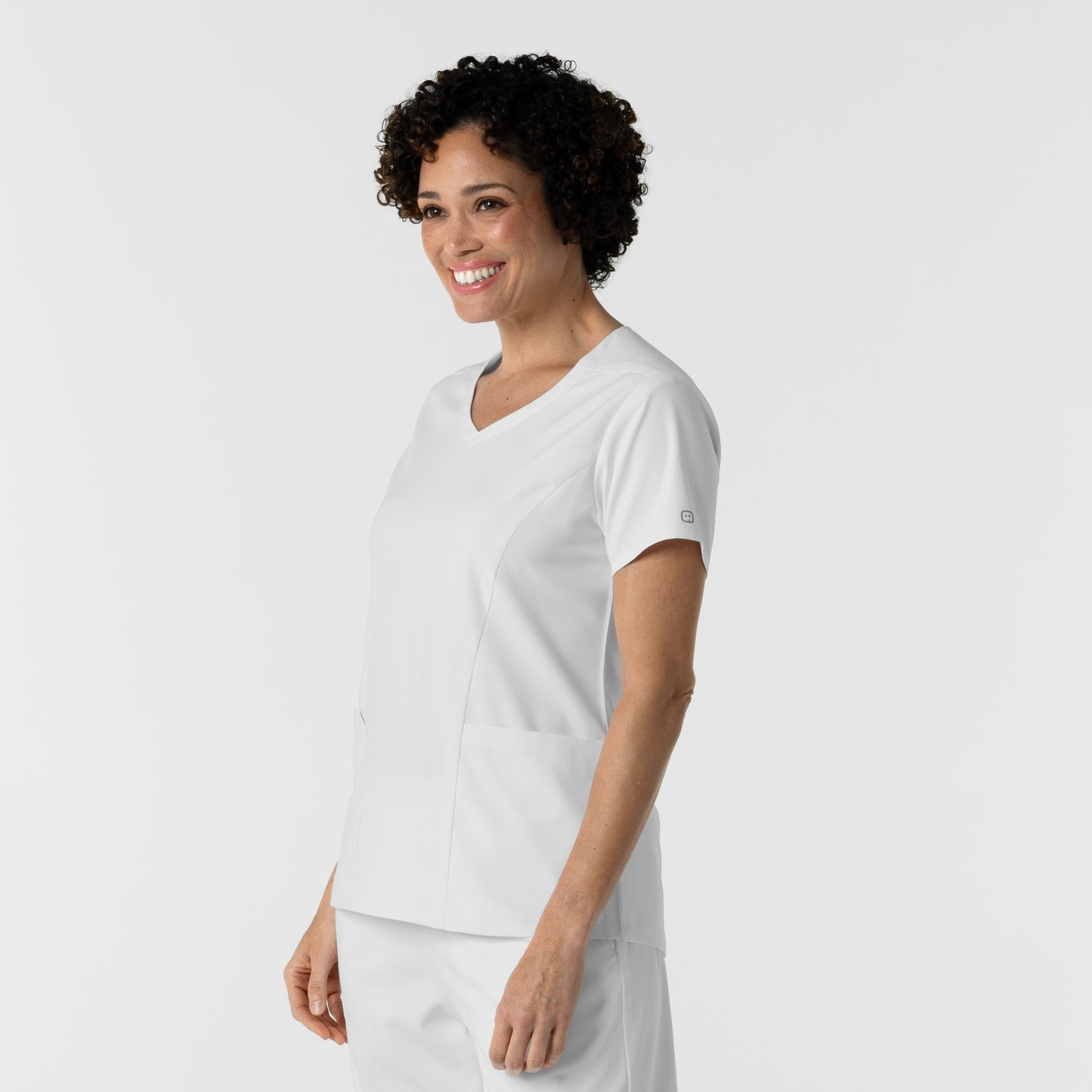 Boundless 6251 2-Pocket V-Neck Scrub Top White Model Image Right Side | Wink